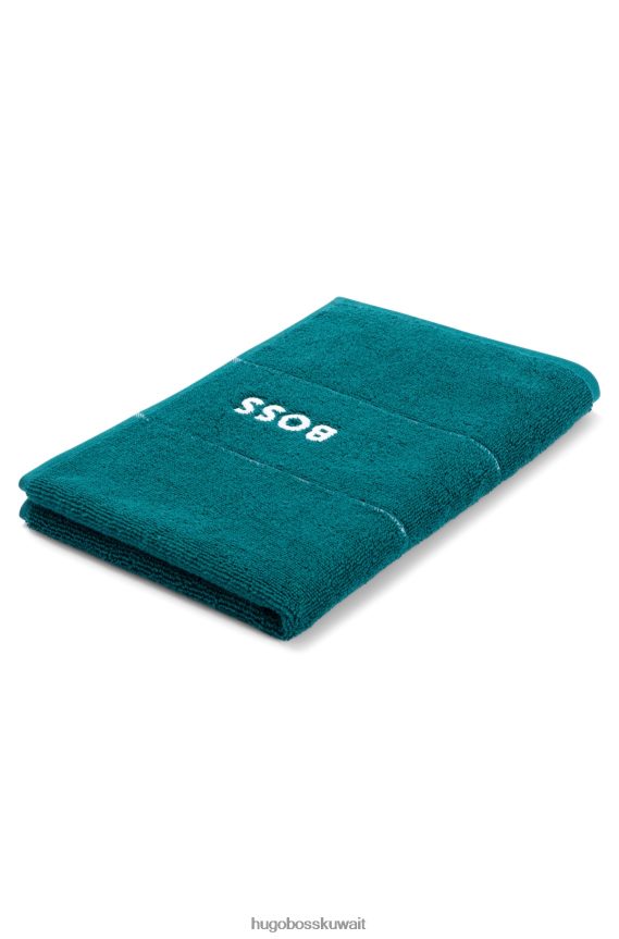 4TFNJN5475 أخضر غامق Hugo Boss منشفة ضيوف من القطن المصري هيوجو باللون الأخضر الداكن مع شعار متباين