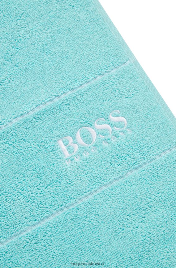 4TFNJN5481 الفيروز Hugo Boss منشفة ضيوف من القطن المصري هيوغو باللون الفيروزي مع شعار متباين