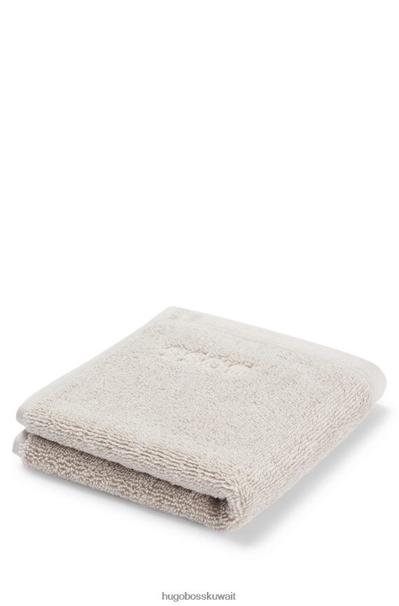 4TFNJN5521 أسود Hugo Boss قطعة قماش سوداء للوجه تحمل علامة Hugo التجارية مصنوعة من قطن بحر إيجه الممشط