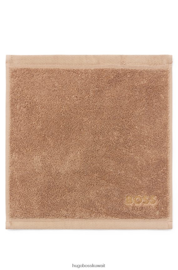 4TFNJN5522 بني Hugo Boss قطعة قماش للوجه تحمل العلامة التجارية Hugo باللون البني مصنوعة من قطن بحر إيجه الممشط