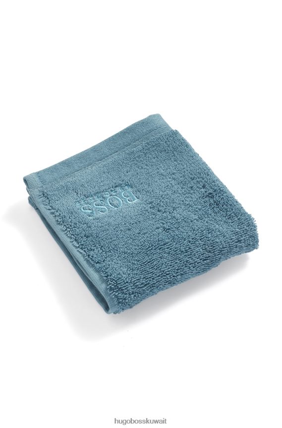4TFNJN5523 أزرق Hugo Boss قطعة قماش للوجه تحمل العلامة التجارية Hugo مصنوعة من قطن بحر إيجه الممشط باللون الأزرق