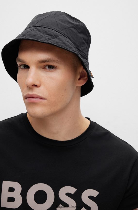 4TFNJN5535 أسود Hugo Boss قبعة دلو مبطنة باللون الأسود من Hugo مع شعار العلم