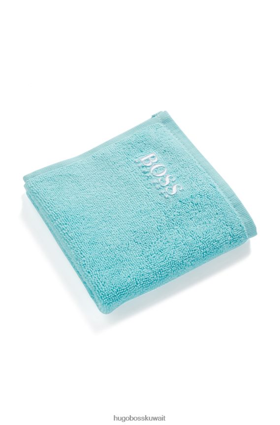 4TFNJN5557 الفيروز Hugo Boss قماش وجه من القطن المصري باللون الفيروزي مع شعار هوغو المتباين