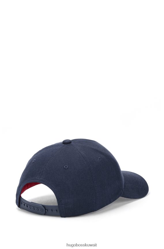 4TFNJN5564 أزرق غامق Hugo Boss قبعة من نسيج قطني طويل مع شعار مطرز هوغو باللون الأزرق الداكن