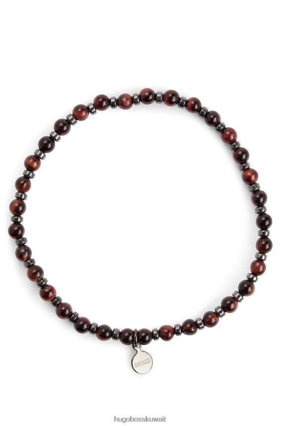 4TFNJN5583 بني Hugo Boss سوار عين النمر البني والهيماتيت مع علامة معدنية تحمل علامة هوغو