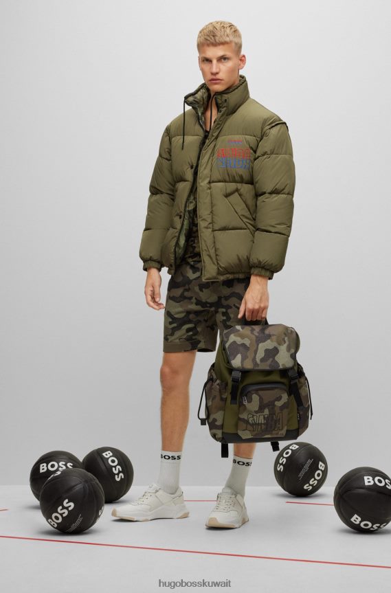 4TFNJN5590 منقوشة Hugo Boss حقيبة ظهر منقوشة بطبعات مموهة تحمل علامة Hugo التجارية التعاونية