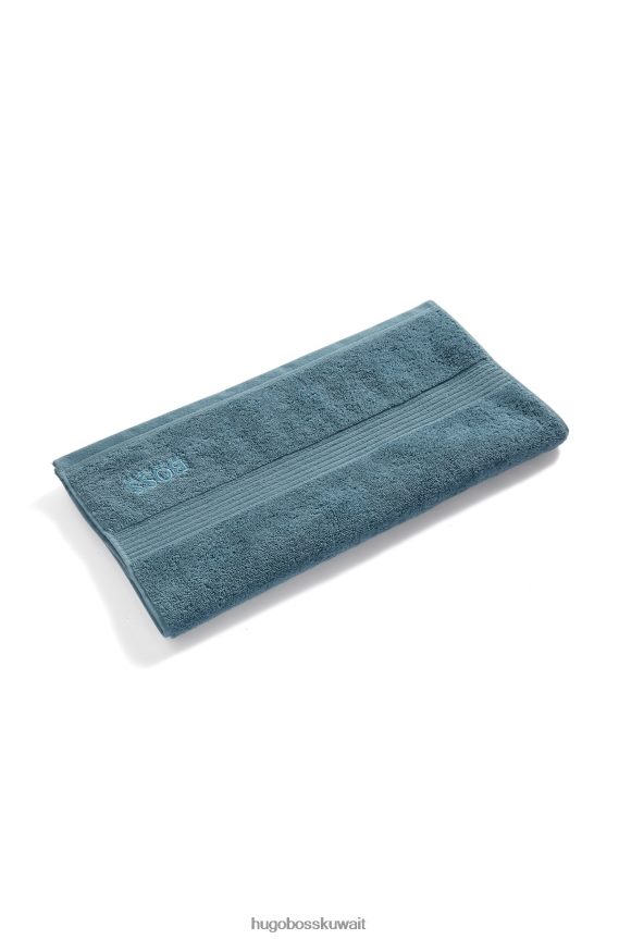 4TFNJN5608 أزرق Hugo Boss منشفة يد بشعار هوغو من قطن بحر إيجة باللون الأزرق