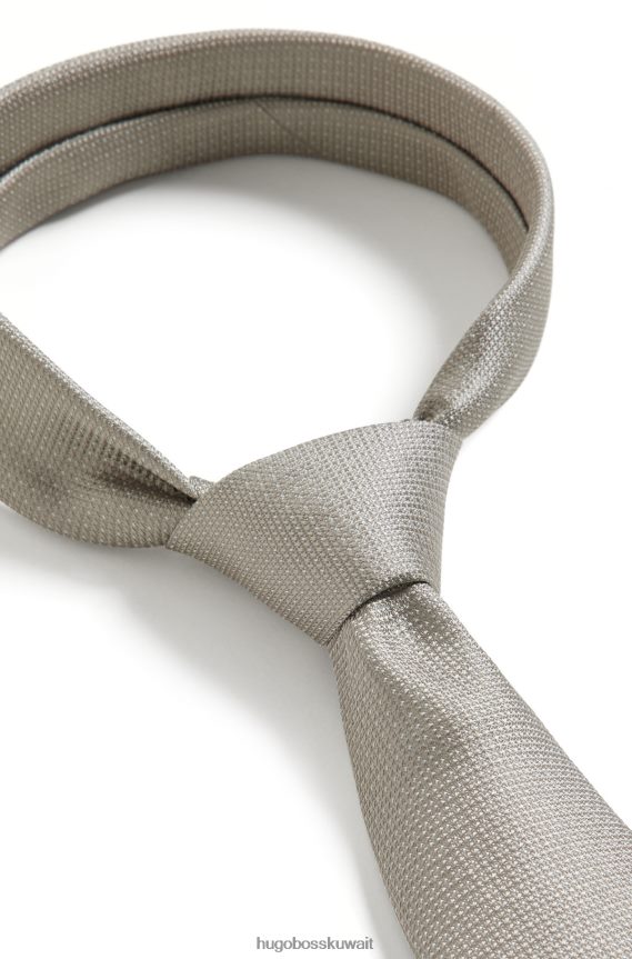 4TFNJN5632 البيج الفاتح Hugo Boss ربطة عنق هوغو منقوشة بشكل دقيق باللون البيج الفاتح من الحرير الخالص