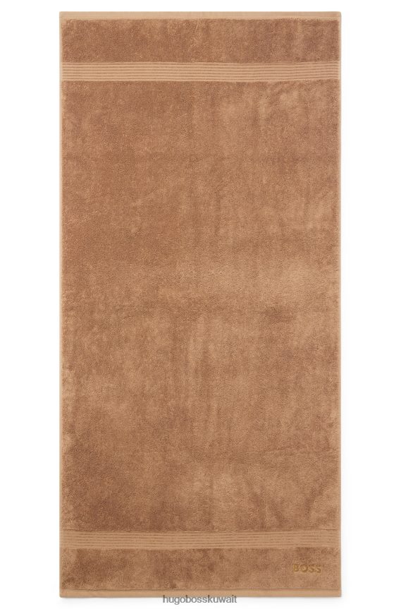 4TFNJN5638 بني Hugo Boss منشفة حمام بشعار هوغو باللون البني من قطن بحر إيجه