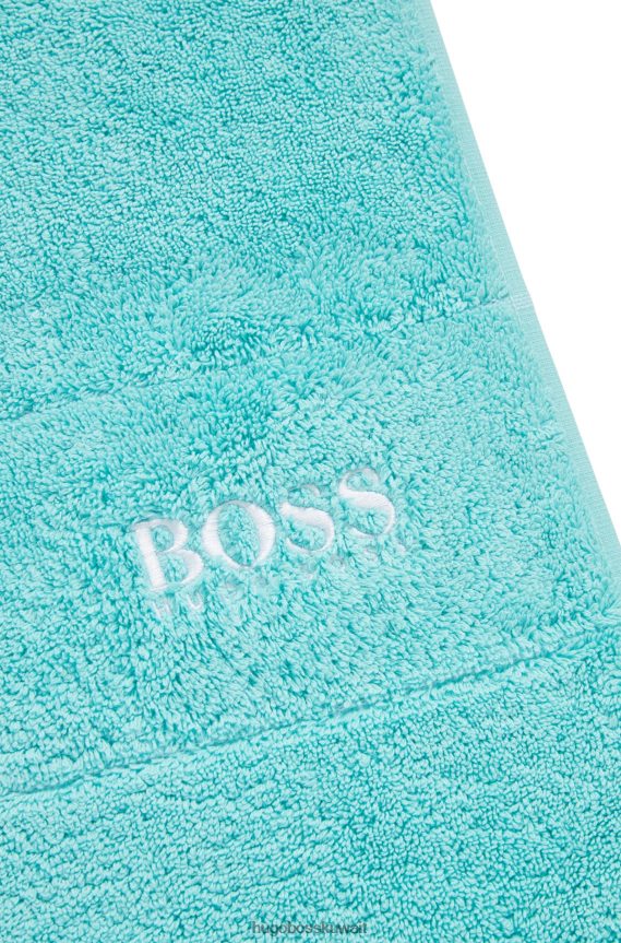 4TFNJN5658 الفيروز Hugo Boss سجادة حمام هوغو من القطن المصري باللون الفيروزي مع شعار متباين