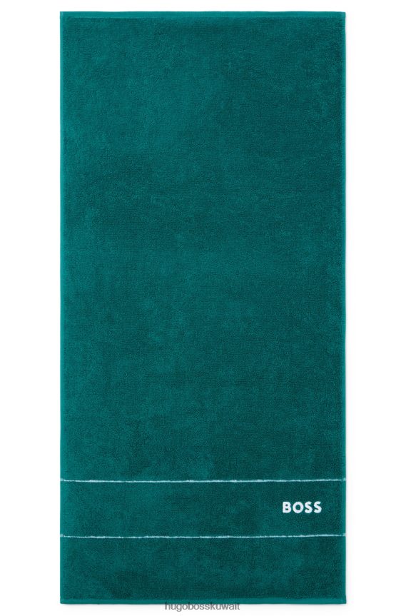 4TFNJN5671 أخضر غامق Hugo Boss منشفة يد هوغو من القطن المصري باللون الأخضر الداكن مع شعار متباين