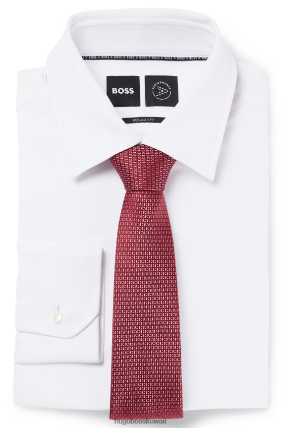 4TFNJN5700 وردي فاتح Hugo Boss ربطة عنق من حرير هوغو باللون الوردي الفاتح ومزينة بأحرف صغيرة على كامل التصميم