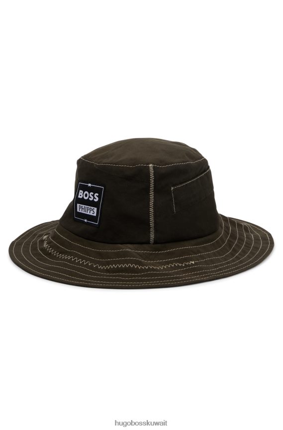 4TFNJN5703 أخضر غامق Hugo Boss قبعة دلو قطنية من phipps مصنوعة من مواد متبقية معاد تصنيعها