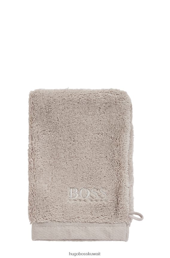 4TFNJN5724 البيج الفاتح Hugo Boss قفاز غسيل بشعار الماركة مصنوع من قطن بحر إيجه باللون البيج الفاتح