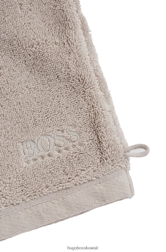 4TFNJN5724 البيج الفاتح Hugo Boss قفاز غسيل بشعار الماركة مصنوع من قطن بحر إيجه باللون البيج الفاتح