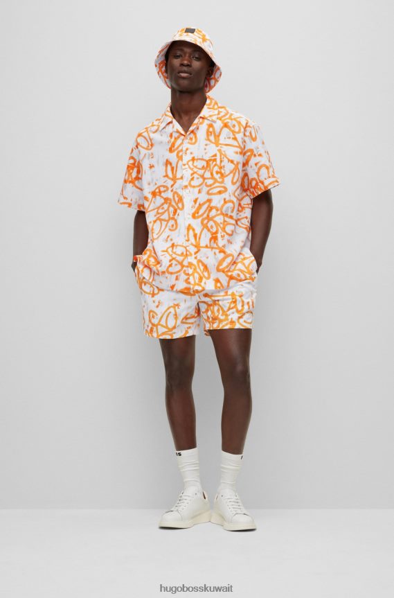 4TFNJN5755 البرتقالي Hugo Boss قبعة دلو باللون البرتقالي من Hugo Graffiti Artwork مصنوعة من نسيج قطني مضلع