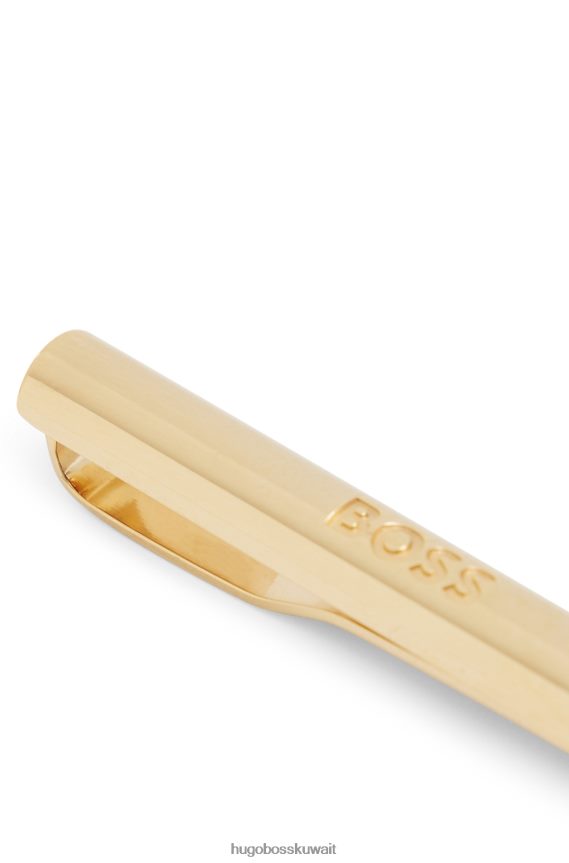 4TFNJN5775 ذهب Hugo Boss مشبك ربطة عنق ذهبي اللون من Hugo مع شعار محفور