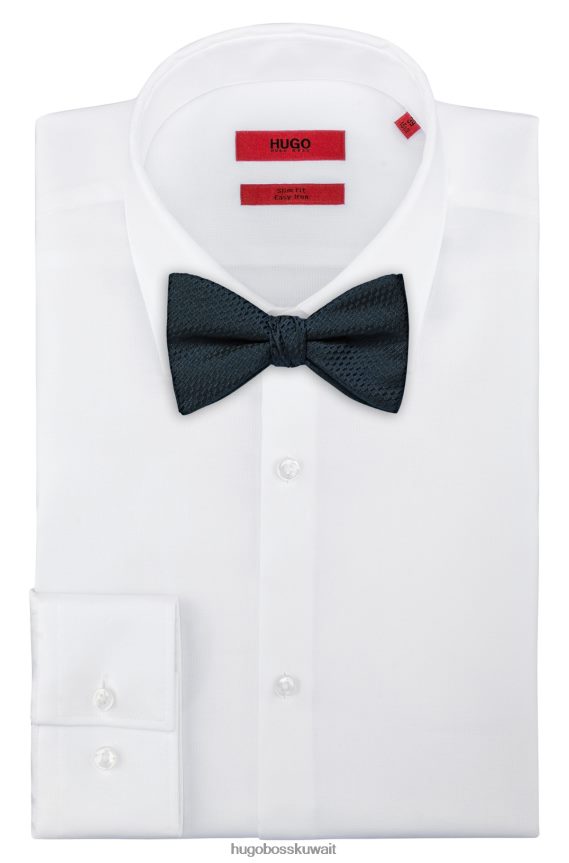 4TFNJN5847 أزرق غامق Hugo Boss ربطة عنق هوغو من قماش الجاكار الحريري باللون الأزرق الداكن مع نقش صغير