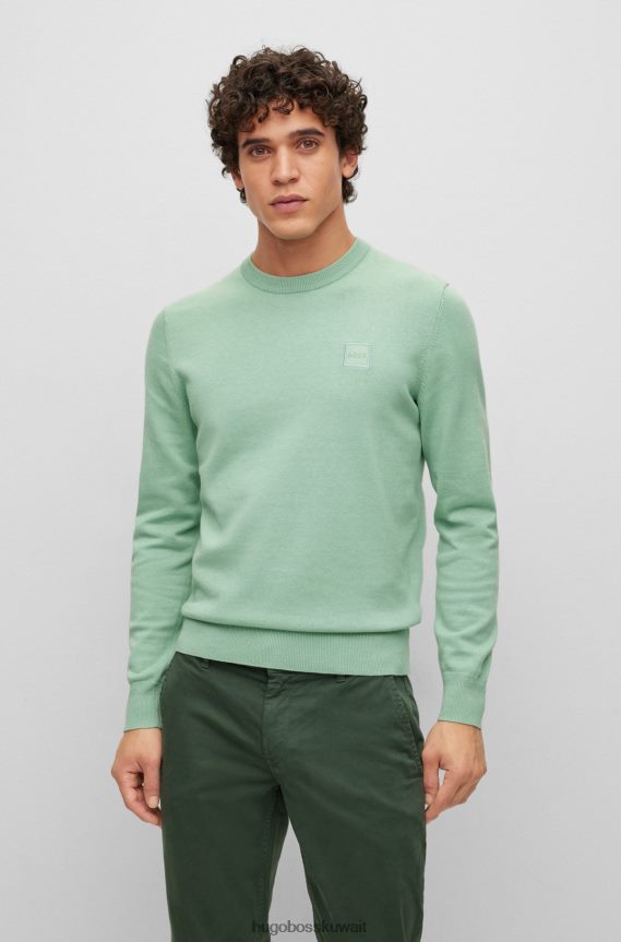 4TFNJN936 اخضر فاتح Hugo Boss سترة هوغو برقبة دائرية باللون الأخضر الفاتح من القطن والكشمير مع شعار