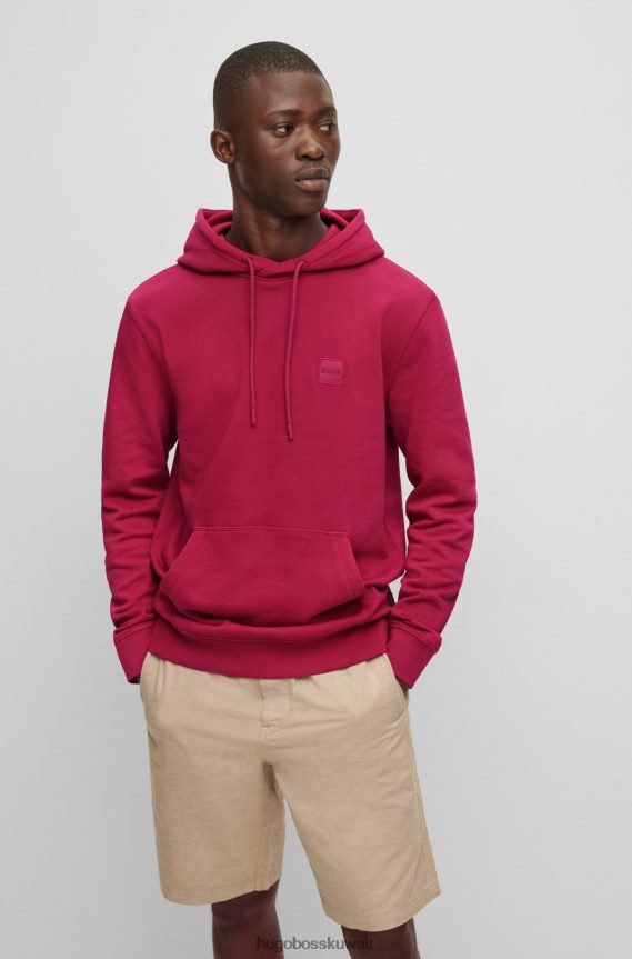4TFNJN939 لون القرنفل Hugo Boss سويت شيرت بغطاء رأس من قطن تيري الفرنسي مع رقعة الشعار باللون الوردي