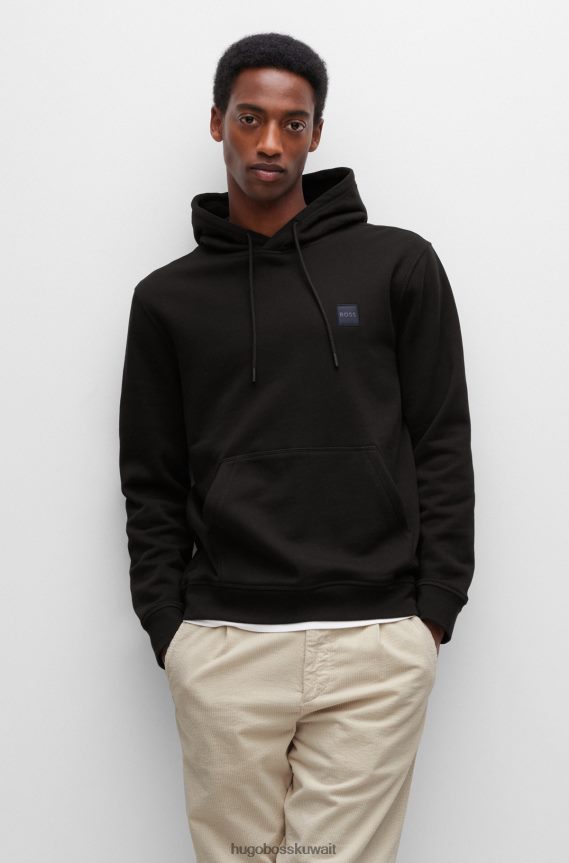 4TFNJN946 أسود Hugo Boss سويت شيرت بغطاء رأس من قطن تيري الفرنسي الأسود مع رقعة شعار هوغو