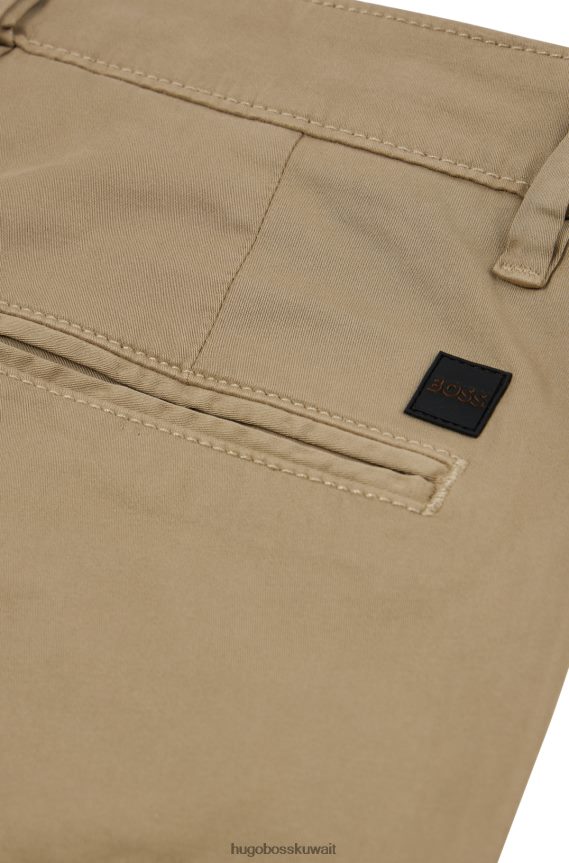 4TFNJN960 اللون البيج Hugo Boss بنطلون هوغو بيج بقصة ضيقة من الساتان القطني المطاطي