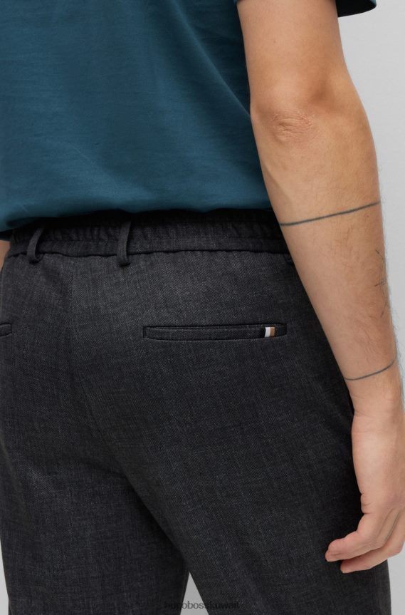 4TFNJN969 رمادي Hugo Boss بنطال بقصّة ضيّقة مصنوع من الجيرسيه المطاطي ذو الأنماط الدقيقة باللون الرمادي من Hugo