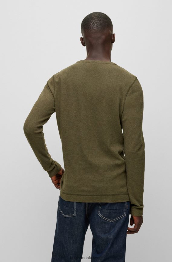 4TFNJN978 أخضر غامق Hugo Boss تيشيرت هوغو أخضر داكن بقصة ضيقة وأكمام طويلة مصنوع من قطن الوافل